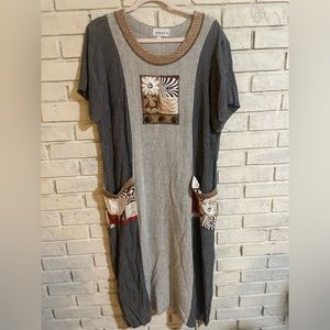 AIMEE D. dress. Relaxed style. Tropical. 21” pit to pit.